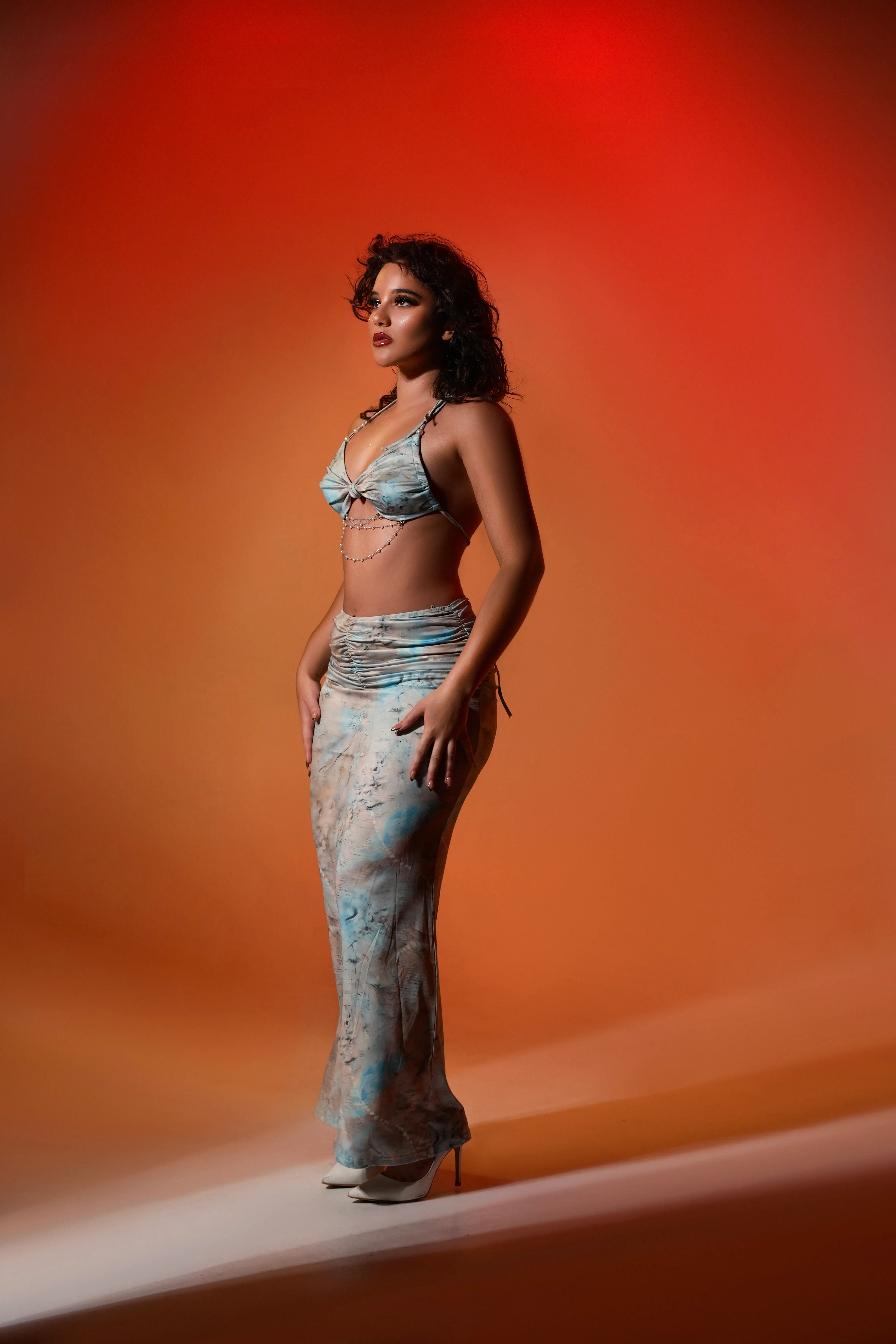 All-black gown — long silhouette, gallery-light mood